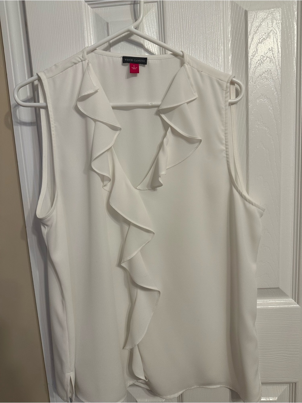 Vince Camuto White Sleeveless Ruffle Front sleeveless top.